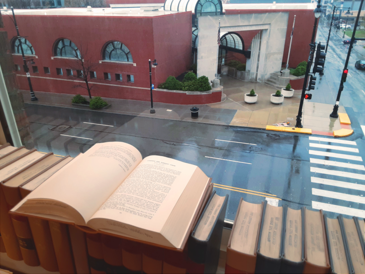 Open book on windowsill overlooking the Missouri Court of Appeals.